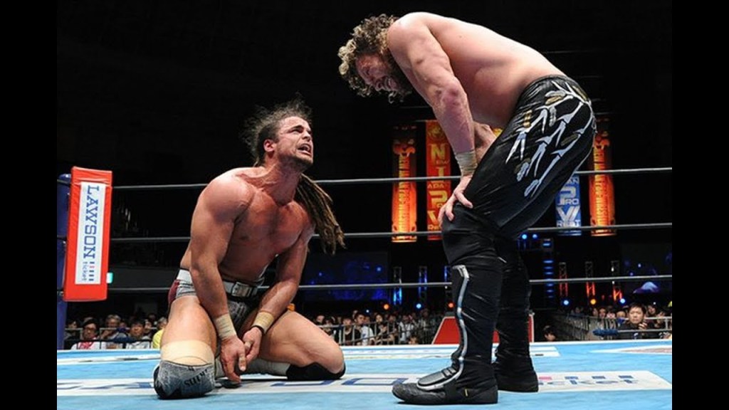 Juice Robinson confronting Kenny Omega in an early encounter for the IWGP US Title